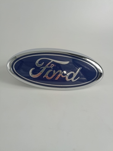 EMBLEMAT LOGO FORD ZDERZAKA PRZÓD 4M51-8216-AA 1360719