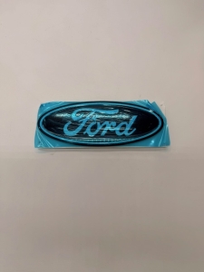 EMBLEMAT PRZÓD EXPLORER/CAPRI OUMA TRANSIT COURIER RU5A-8B262-NCA 2700942